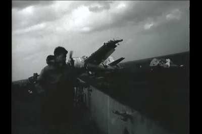 General Motors FM-2 Wildcat misses the wire while landing on USS Guadalcanal in 1945