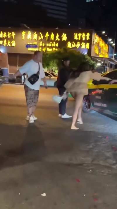 Woman in Bangkok caught her boyfriend speaking to another woman. He bought her flowers to ask for forgiveness but she refused to forgive him.