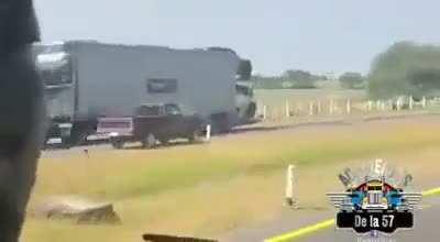 Pickup truck drives into oncoming traffic