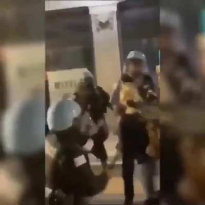 Officials tackle then beat a woman that was walking away