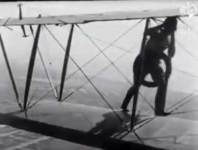 Woman pilot fixes new landing wheel mid air
