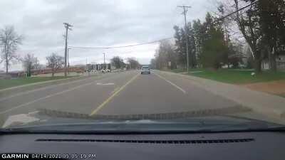Dude blasts through a school zone in the middle turning lane and turns left at a red arrow. I assume he is about to poop his pants and needs to get home.