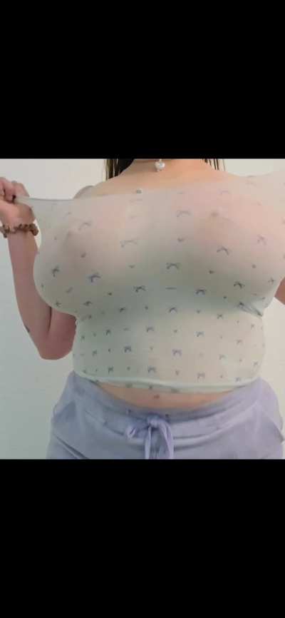 Just a chubby busty little redhead in a tight wet white top