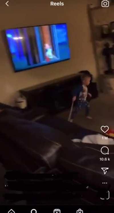 Kid smashes flat screen TV