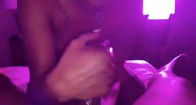 She's making love under neon lights