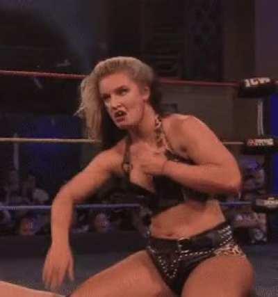 Toni adjusting her top