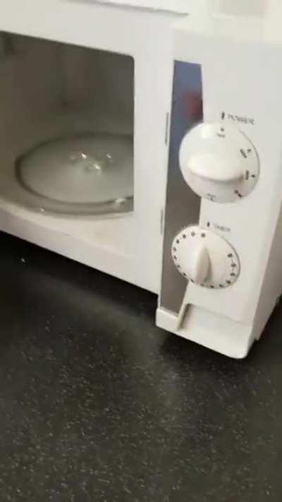 Ejection button for the microwave