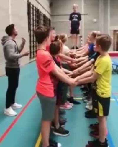 Kids try a trust exercise