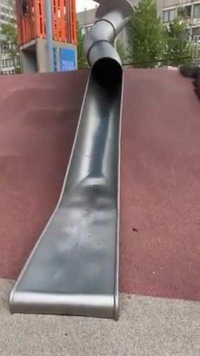 A Boston policeman took it upon himself to personally check the safety of the playground slide. 🤯😨👮‍♂️