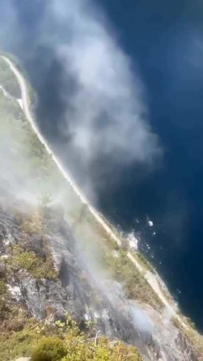 Removing loose rock from a slope