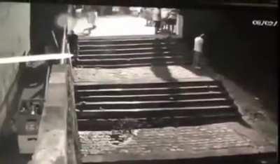 Just outside on the steps having a nice quiet piss ...