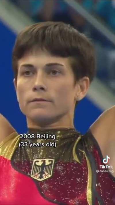 This is Oksana Chusovitina who competed in the Olympics 8 times. She is from Uzbekistan.