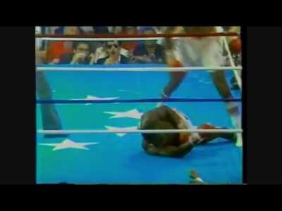 Earnie Shavers lands a Right-Hand from Hell on Larry Holmes