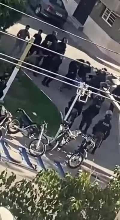 A dozen IR terrorists violently beat a LITERAL CHILD