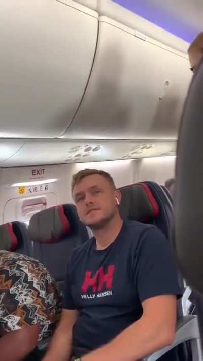 Sick, insecure, toxic woman berates, curses at, and assaults a man onboard a plane