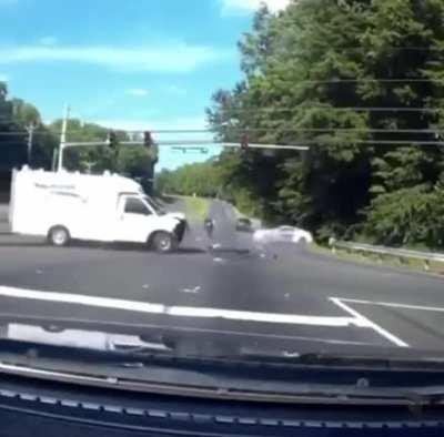 Motorcyclist threads the needle of death