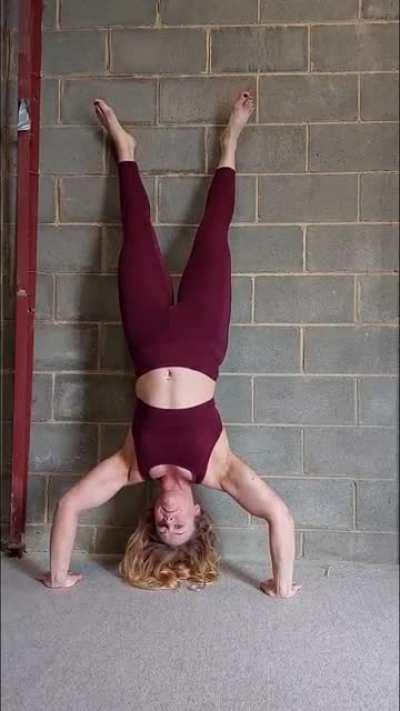 Attempting handstand push ups