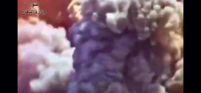 Iraqi Air Force attack helicopter destroys isis VBIED during the war against isis.