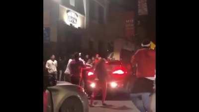 An Uber driver goes to pick up a customer only to be met with a vicious mob. They go after the passenger and the driver and punch repeatedly and damage his car. (Morgantown, West Virginia)