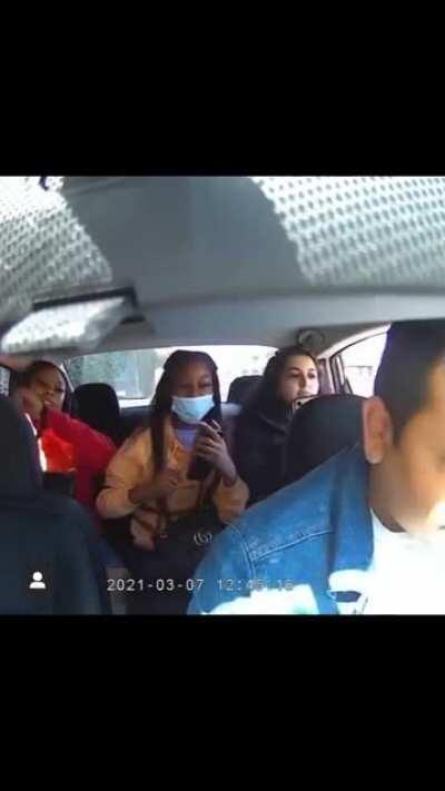 Uber driver gets attacked by rowdy passengers after asking one of them to put on a mask. (With sound on this time)