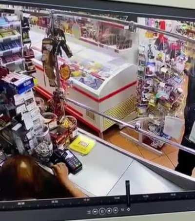Angry customer maces elderly female cashier