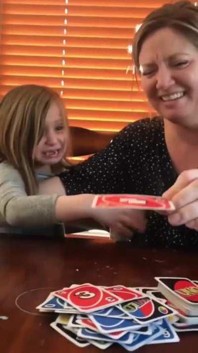 If this doesn't perfectly describe the family Uno experience I don't know what does