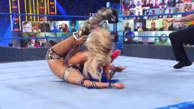 Carmella destroys Sasha Banks with a Mella Buster