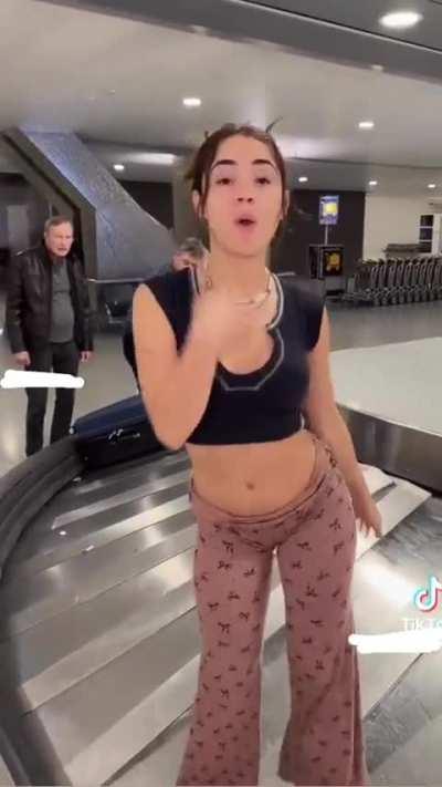 The way she rolled down her waistband to make sure as much of her abdomen is on display as possible. I’d be so irritated if I had to ensure this after a 10hr flight