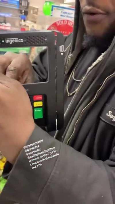 7-Eleven cashier gets caught with a skimmer by customers