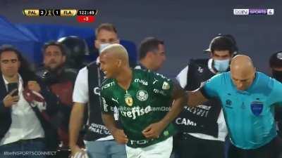 Brazilian player dives at the touch of the referee.