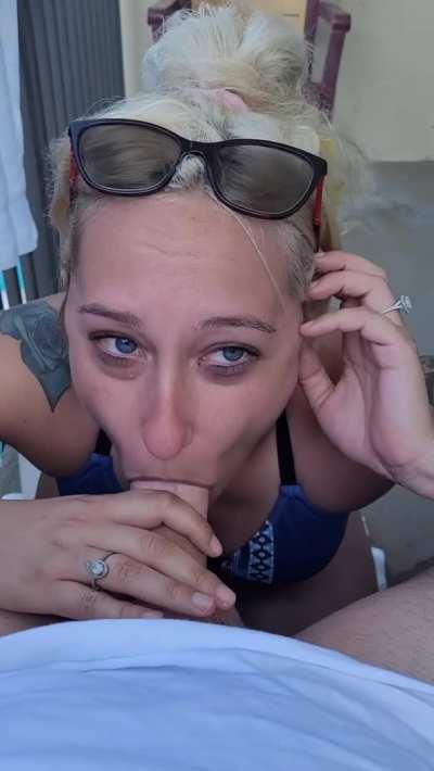 Blowjob on the balcony while the towels dry