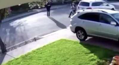 Kid with a gun attempts to rob someone and gets absolutely decked