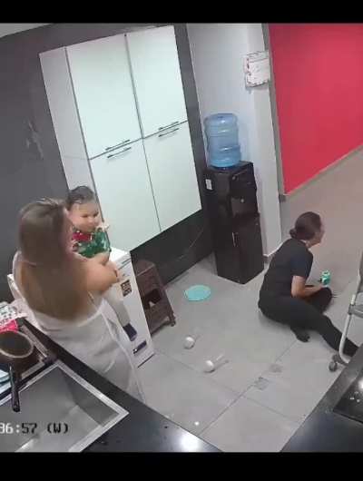 Exhausted mother gives the bottle to her friend instead of the baby