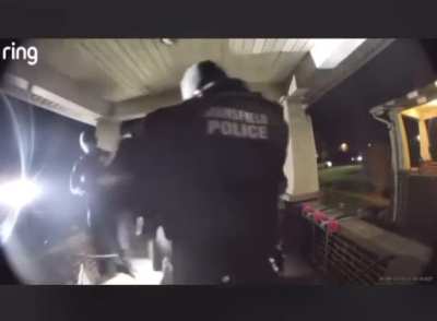 Cops arrest man standing on his porch