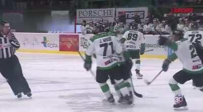 HK Nitra’s goalie Matt O’Connor slashes an opposing player who ran into him moments before