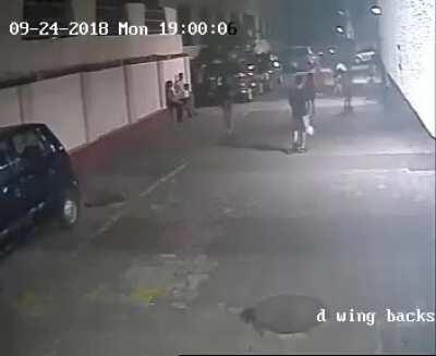 Kid ran over by a car while tying his shoes (not NSFW)