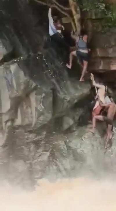 Bravehearts rescuing a mother and child trapped in gushing waterfall in Tamilnadu, India