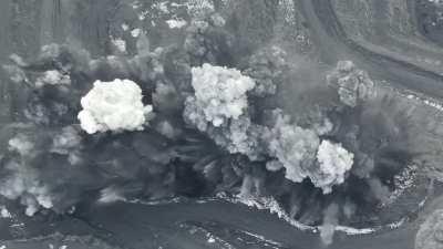 Open pit blastworks, sound on, slowed zoom in