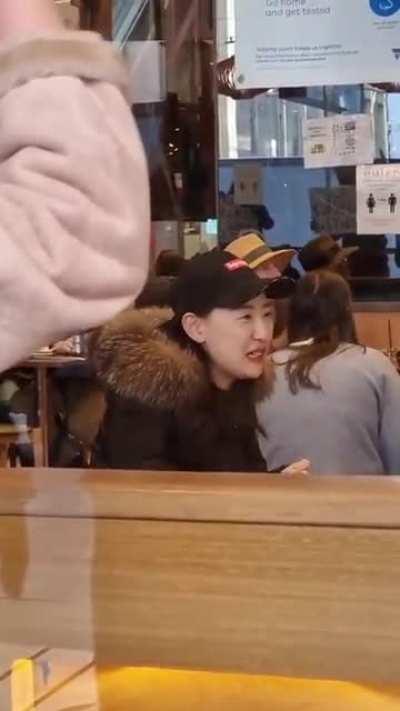 Woman in restaurant getting harassed by vegans because she's wearing a fur coat