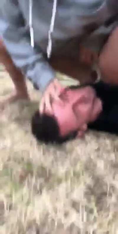 Blasting his face with piss in the yard