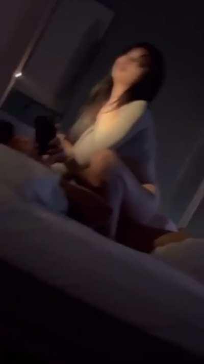 Looking in the mirror while she rides