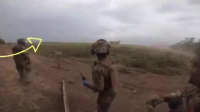 An artillery shell exploded 100 meters from a group of Ukrainian soldiers, yet some shrapnel missed the group by just a meter.