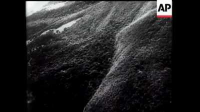 Bf 110 dogfighting with a Soviet biplane at low level in 1942