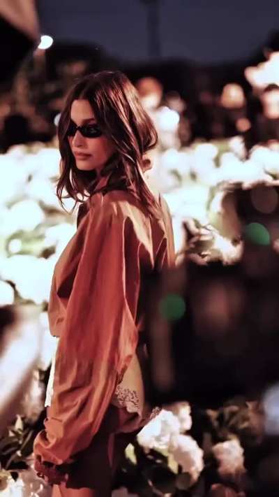 Hailey at the Saint Laurent Fashion Show as part of Spring/Summer 2026 Paris Fashion Week held at Fontaine du Trocadéro - IG September 2025