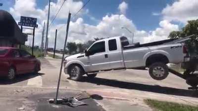 Guy tries to save his truck from the repo man