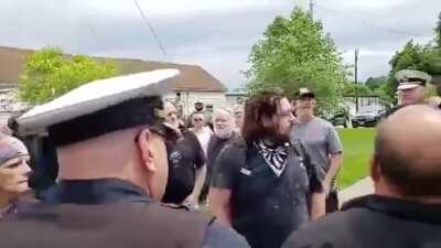 BETHEL, Ohio - while getting yelled at by an angry mob of Trump supporters, protestor gets PUNCHED IN THE BACK OF THE HEAD right in front of multiple police officers... who do nothing.
