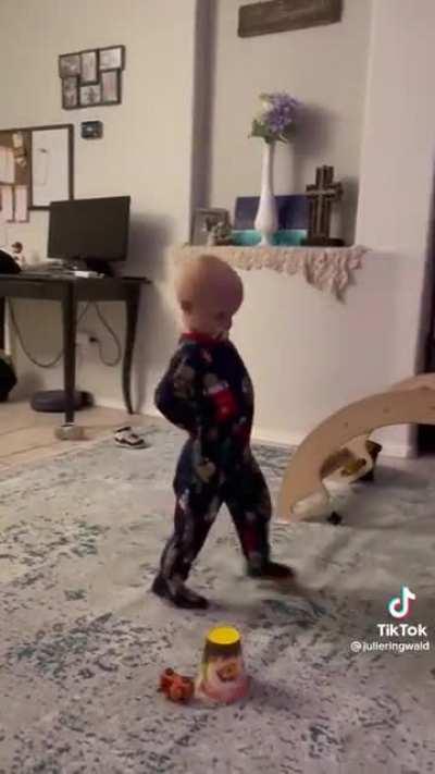 Trying to mimic his mom...