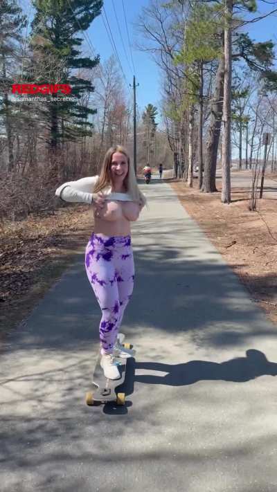 Slow-mo of me flashing my big titties on my longboard ;)