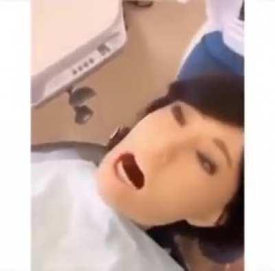 Dentist Robot screaming as if she's become aware