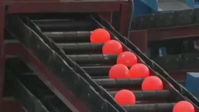Steel balls being formed. The balls made in this particular video will be used for grinding application in the mining industry.